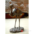 metal garden flamingo statue in bronze
